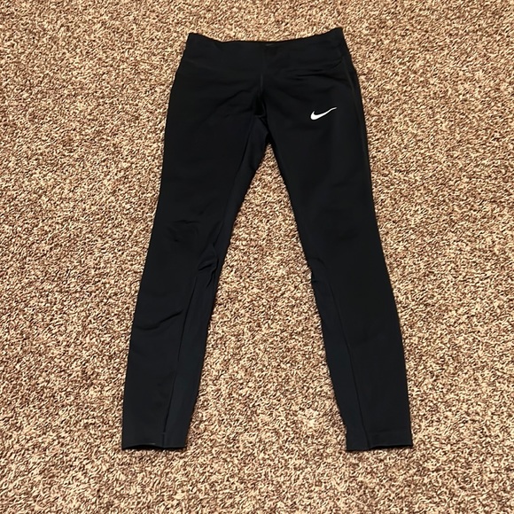 Nike Dri Fit size small black leggings. EUC. zip back pocket, mesh calf detail. - Picture 1 of 11